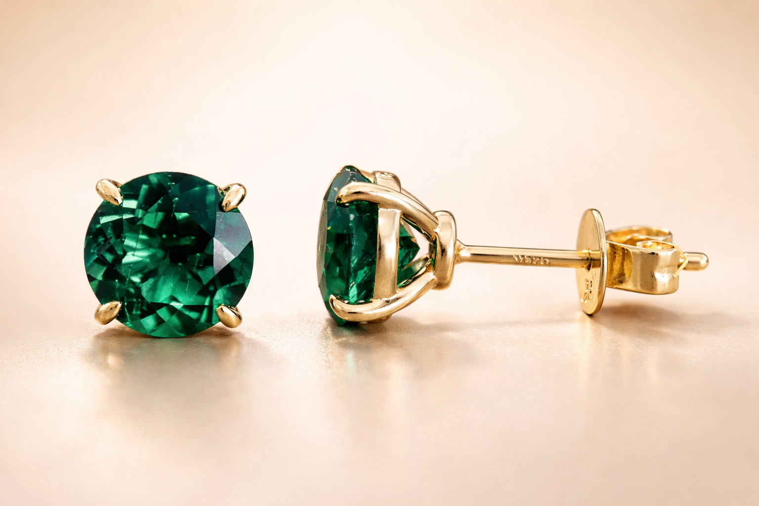 Verdure Zambian emerald stud earrings in gold by Maison Soléne